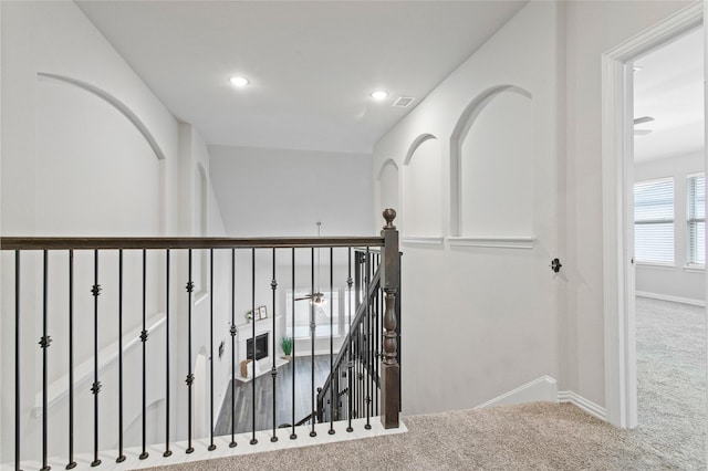 corridor with carpet floors