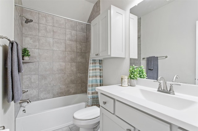 full bathroom with tile patterned flooring, vanity, shower / tub combo, and toilet