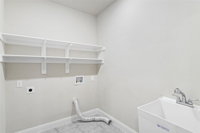 washroom featuring sink, hookup for a gas dryer, light tile patterned floors, hookup for a washing machine, and hookup for an electric dryer