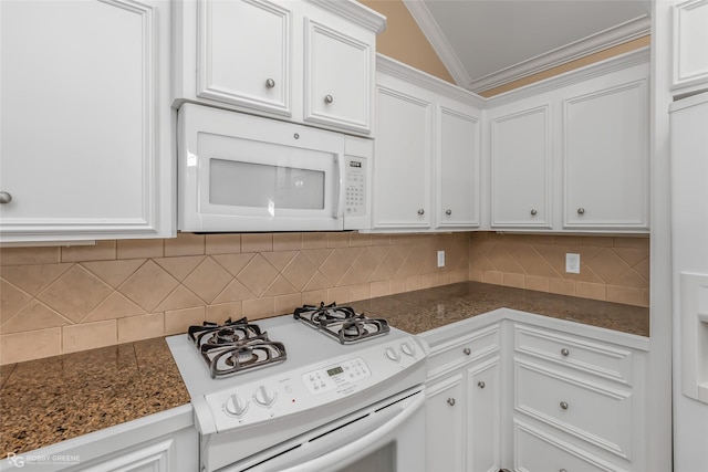 kitchen featuring white appliances, ornamental molding, decorative backsplash, and white cabinets