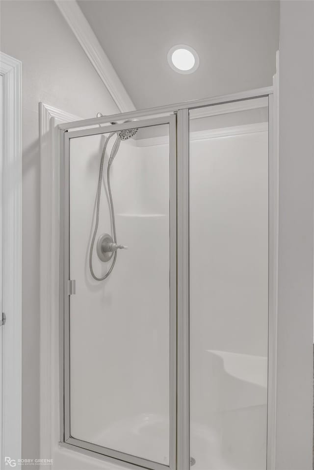 bathroom featuring an enclosed shower