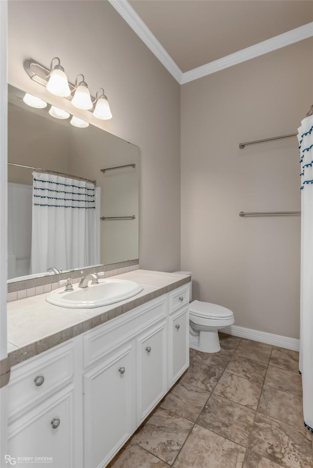 bathroom with crown molding, vanity, toilet, and curtained shower