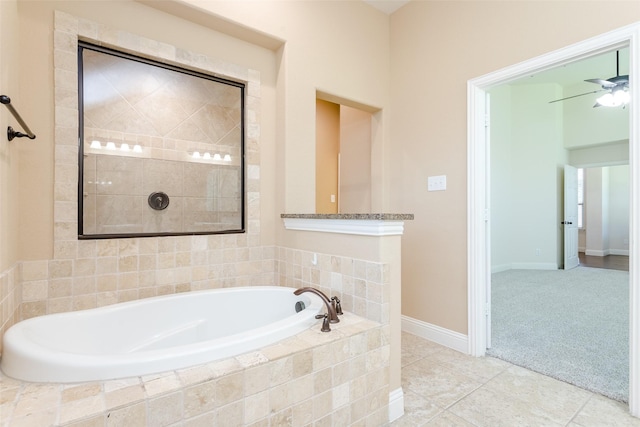 bathroom featuring ceiling fan, shower with separate bathtub, and tile patterned flooring