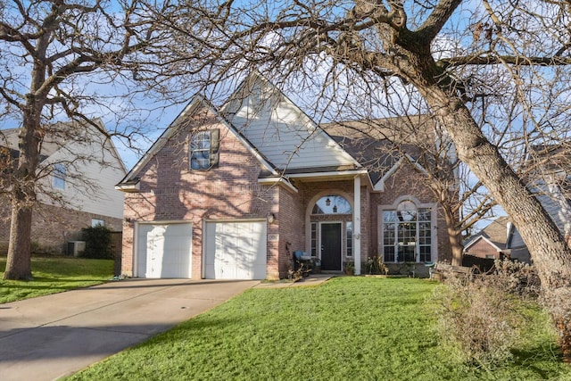 front facade with a garage and a front yard