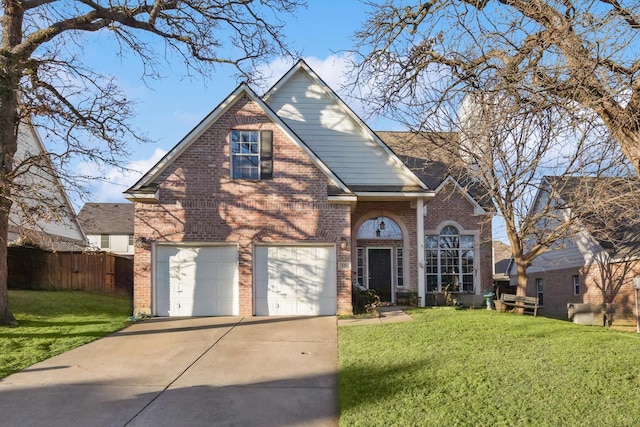 front of property with a garage and a front lawn