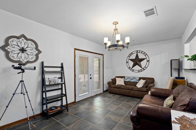 living room featuring a chandelier