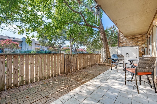 view of patio with a grill