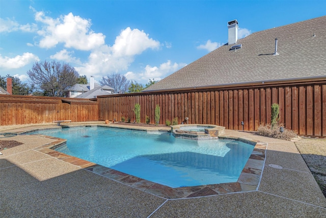 view of pool with a diving board and an in ground hot tub