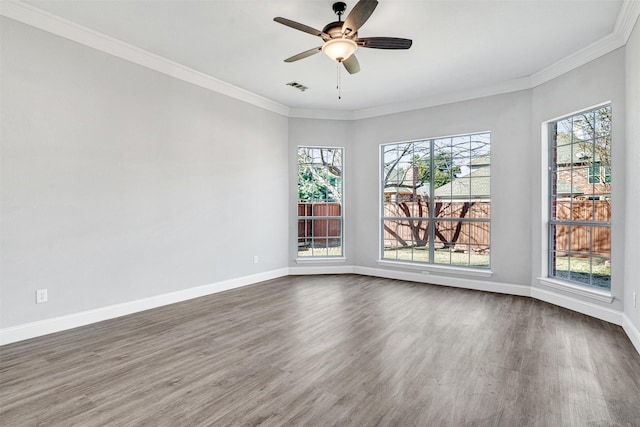 unfurnished room featuring crown molding, ceiling fan, and dark hardwood / wood-style flooring