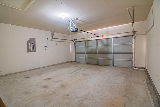 garage featuring a garage door opener and electric panel