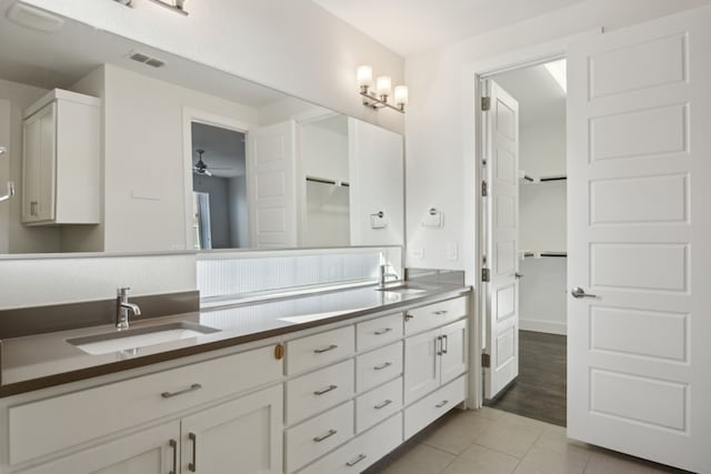 bathroom featuring vanity, tile patterned floors, and ceiling fan