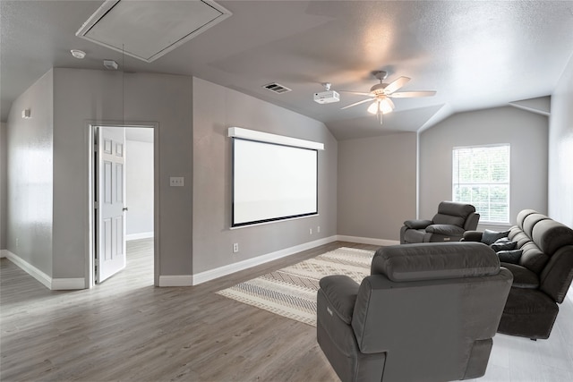 4201 Broken Bend Blvd, Fort Worth, TX 76244 - cinema with light wood finished floors, a ceiling fan, and vaulted ceiling
