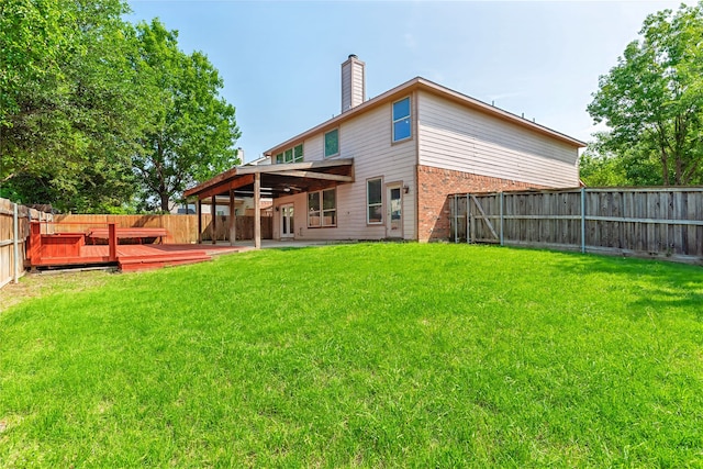 4201 Broken Bend Blvd, Fort Worth, TX 76244 - rear view of property featuring a fenced backyard, a deck, a chimney, brick siding, and a patio area