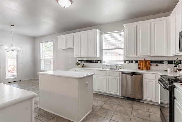 4201 Broken Bend Blvd, Fort Worth, TX 76244 - kitchen with dishwasher, electric range, a chandelier, white cabinets, and tasteful backsplash
