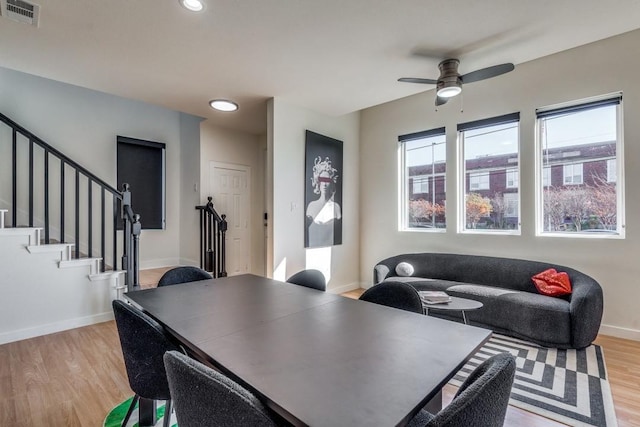 dining room featuring ceiling fan and light hardwood / wood-style floors