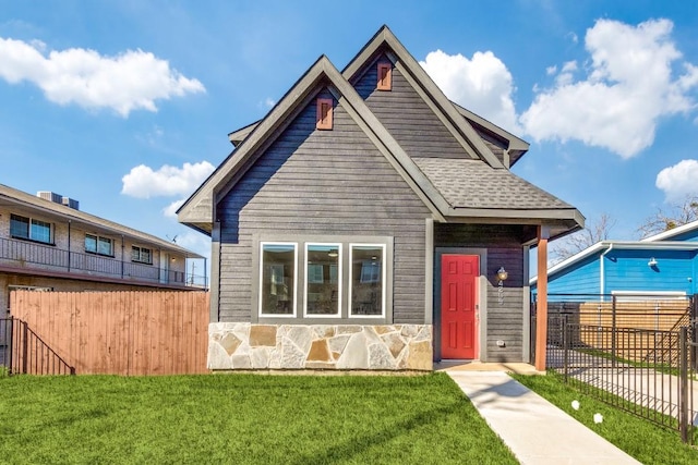 view of front of home with a front lawn