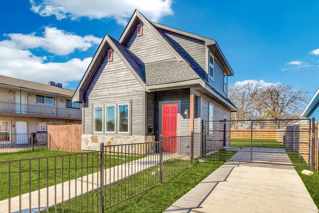 view of front of home with a front lawn