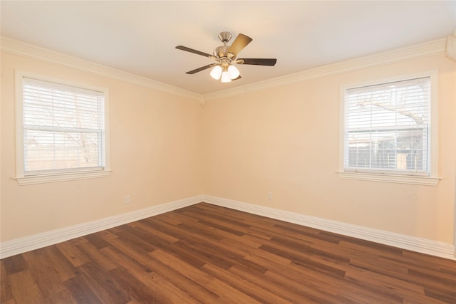 spare room with ornamental molding, dark wood-type flooring, and ceiling fan