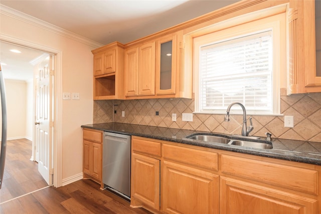 kitchen with dishwasher, sink, dark stone countertops, dark hardwood / wood-style flooring, and crown molding