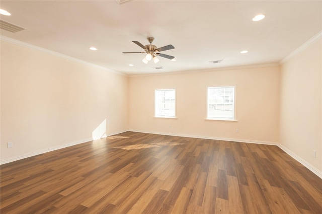 unfurnished room featuring crown molding, dark wood-type flooring, and ceiling fan