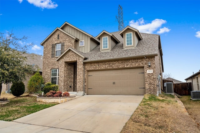 view of property featuring central AC and a front yard