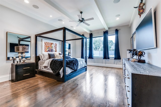 bedroom featuring beamed ceiling and hardwood / wood-style flooring