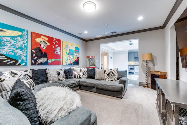 carpeted living room with ornamental molding