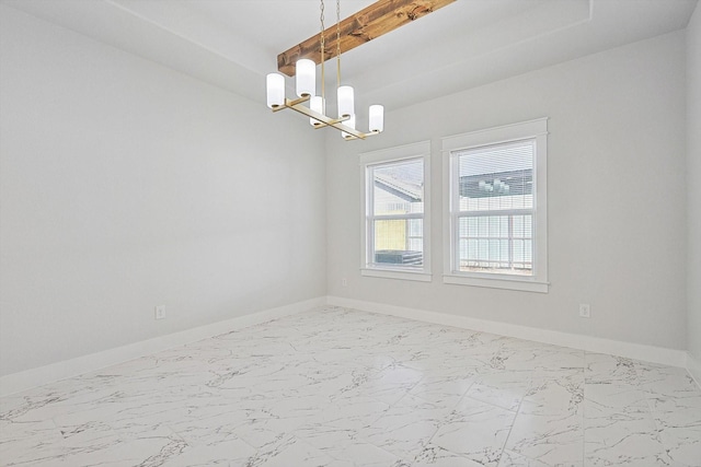 unfurnished room with a notable chandelier