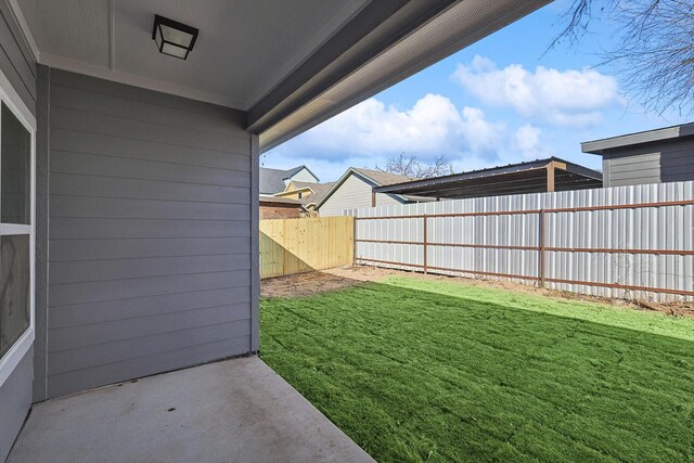 doorway to property featuring a lawn