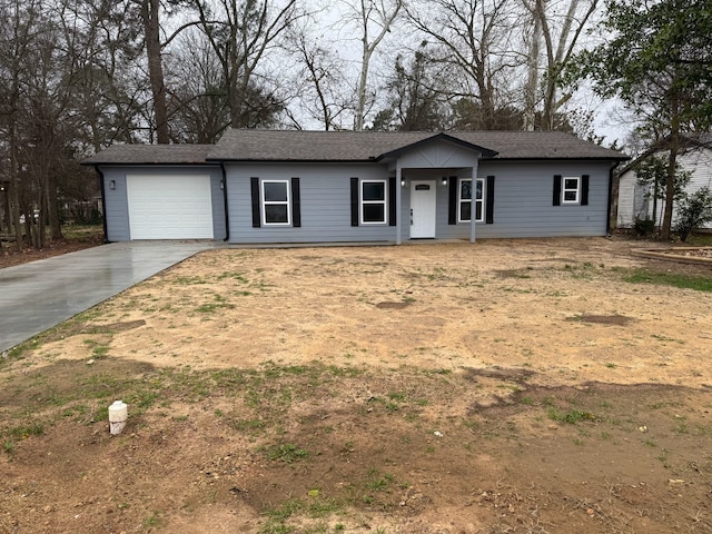 single story home featuring a garage