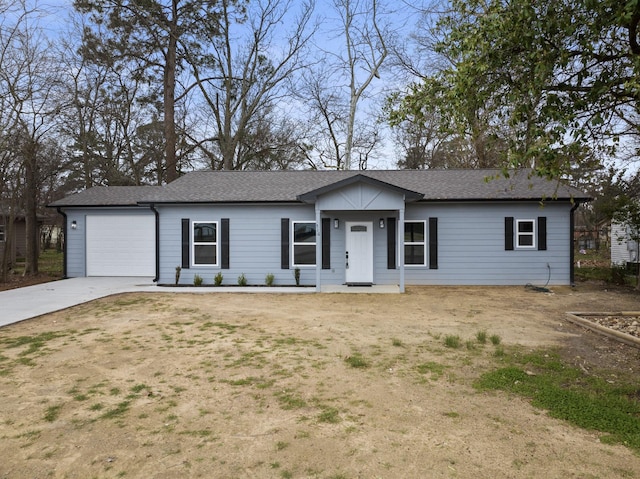 single story home with an attached garage and concrete driveway