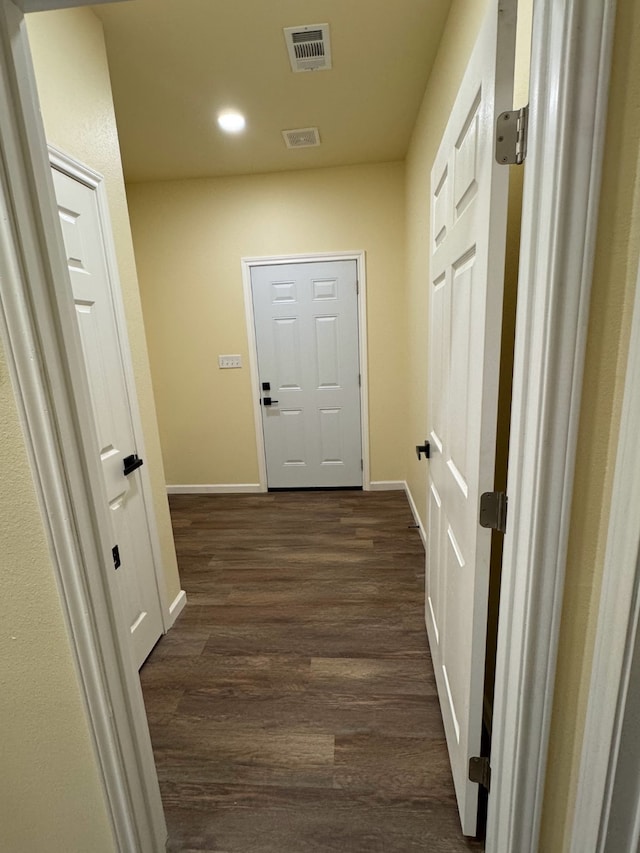 hall featuring dark hardwood / wood-style floors