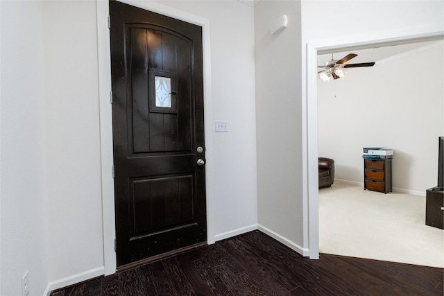 entryway featuring dark hardwood / wood-style floors and ceiling fan