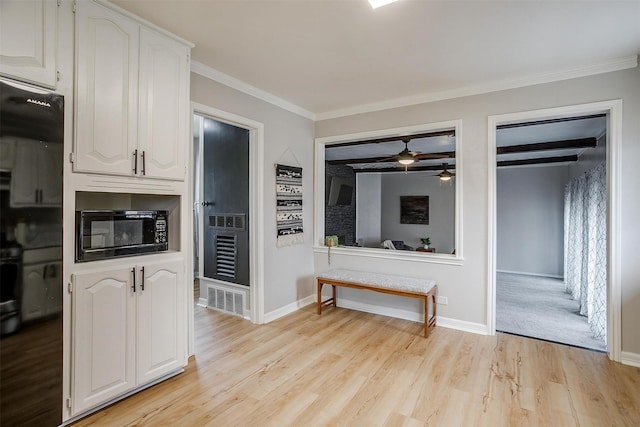 kitchen with crown molding, white cabinetry, range with electric stovetop, light hardwood / wood-style floors, and beamed ceiling