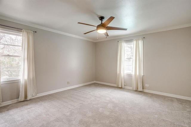 unfurnished room with crown molding and a wealth of natural light