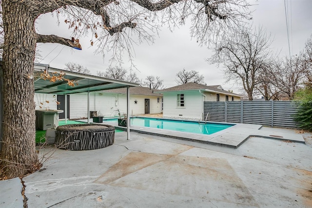 view of pool featuring a patio area