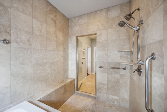 bathroom featuring tiled shower