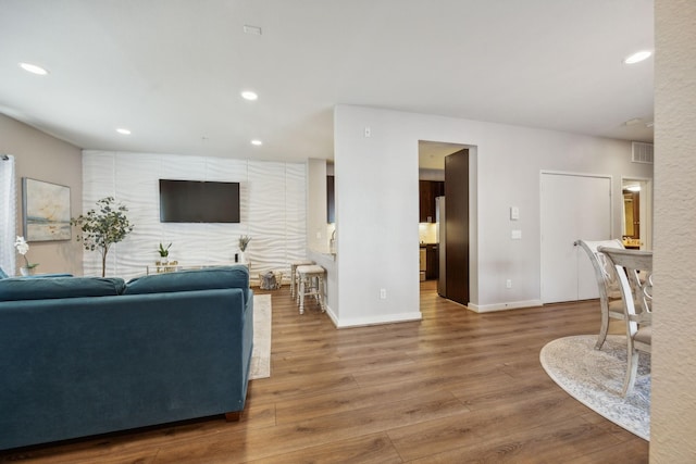 living room with hardwood / wood-style floors