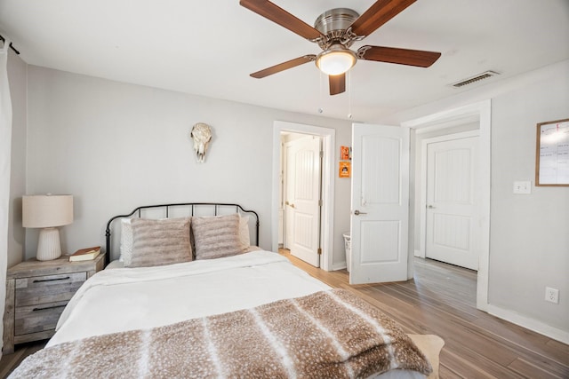 unfurnished bedroom featuring ceiling fan and light hardwood / wood-style flooring