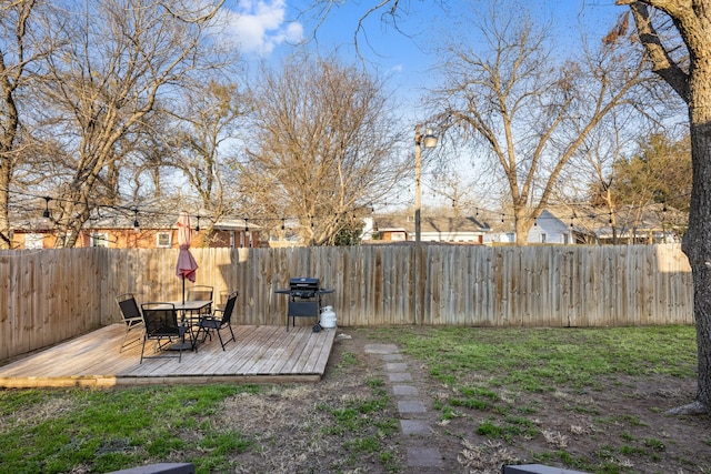 view of yard with a deck