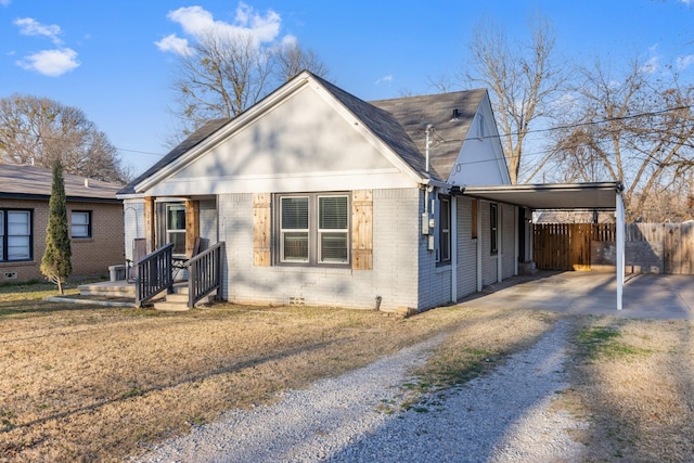 view of front of house featuring a carport