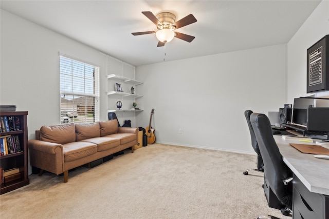 office with light carpet and ceiling fan