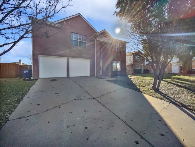 view of front of property with a garage