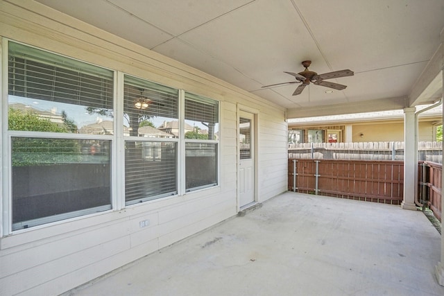 view of patio featuring ceiling fan