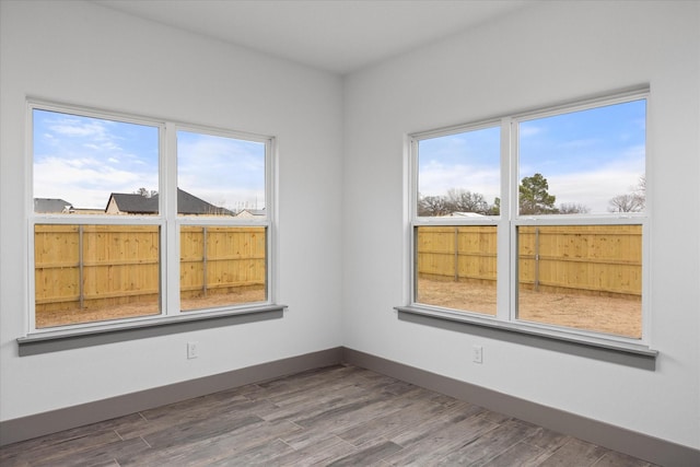 empty room featuring hardwood / wood-style floors