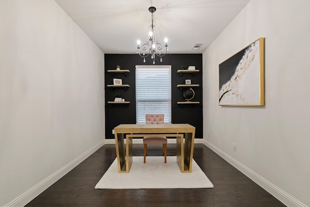 office area with dark hardwood / wood-style floors and a chandelier