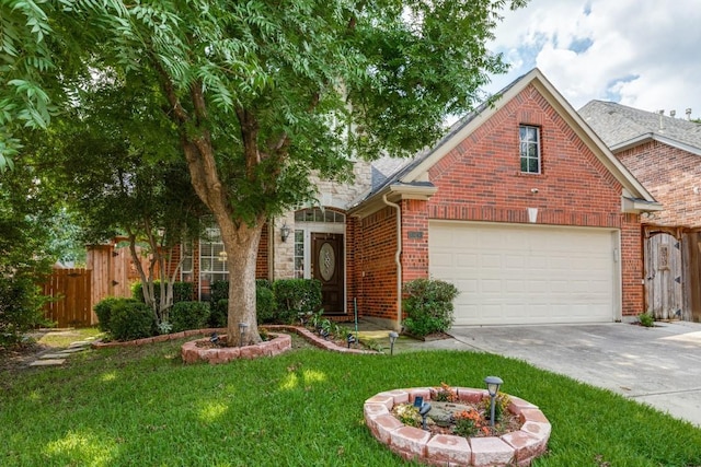 view of front of home featuring a garage and a front lawn