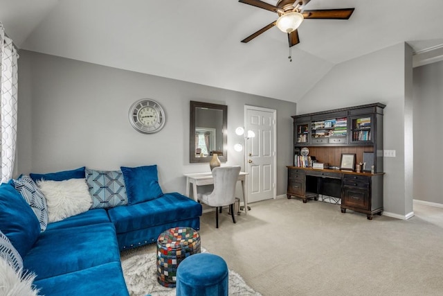 living room with vaulted ceiling, light colored carpet, and ceiling fan