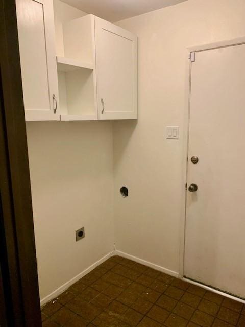 laundry room featuring cabinets and electric dryer hookup