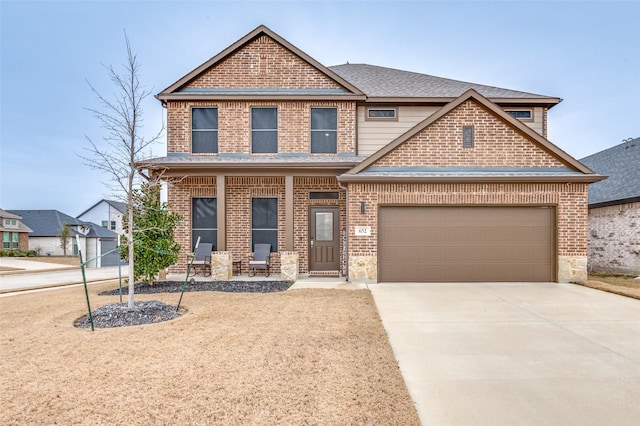 craftsman house featuring a garage and covered porch